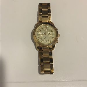 Michael Kors women’s gold watch